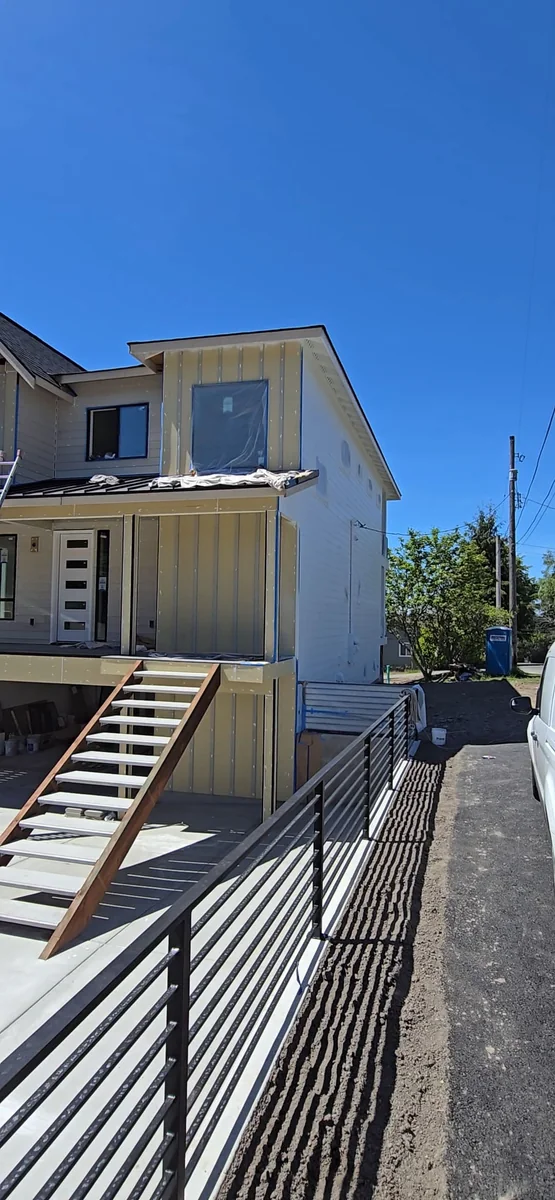 Exterior entry and siding detail from video capture