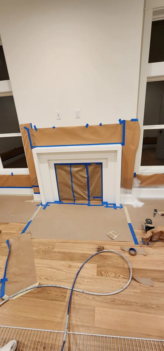 Masked fireplace and interior prep area