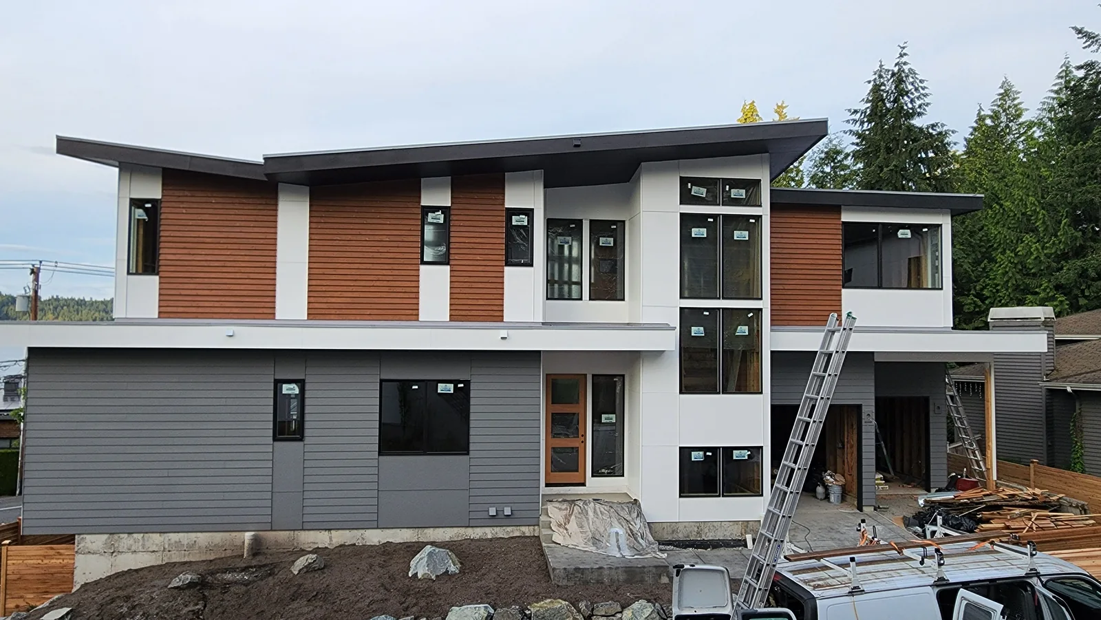 Completed modern exterior with clean siding finish